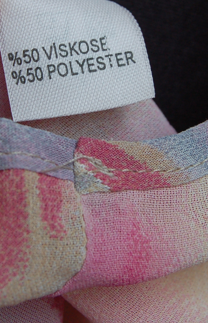 Elegantní dámská halenka bez rukávů - fialová.